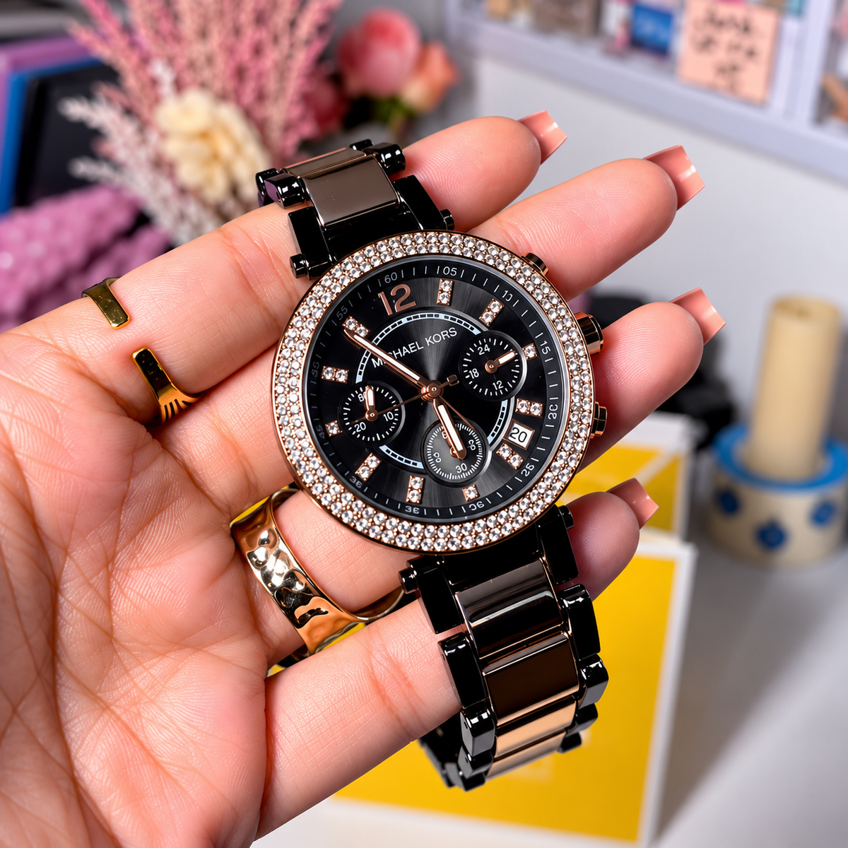MK Parker Black Gold watch close-up showing the three chronograph sub-dials