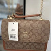 Coac_h Handbag Klare Crossbody in Blocked Signature Canvas With folding 191