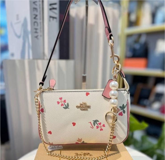 Coacch_Nolita_19_Flowers_With_OriginalBox_DustCover_ChainBelt_PearlCharm
